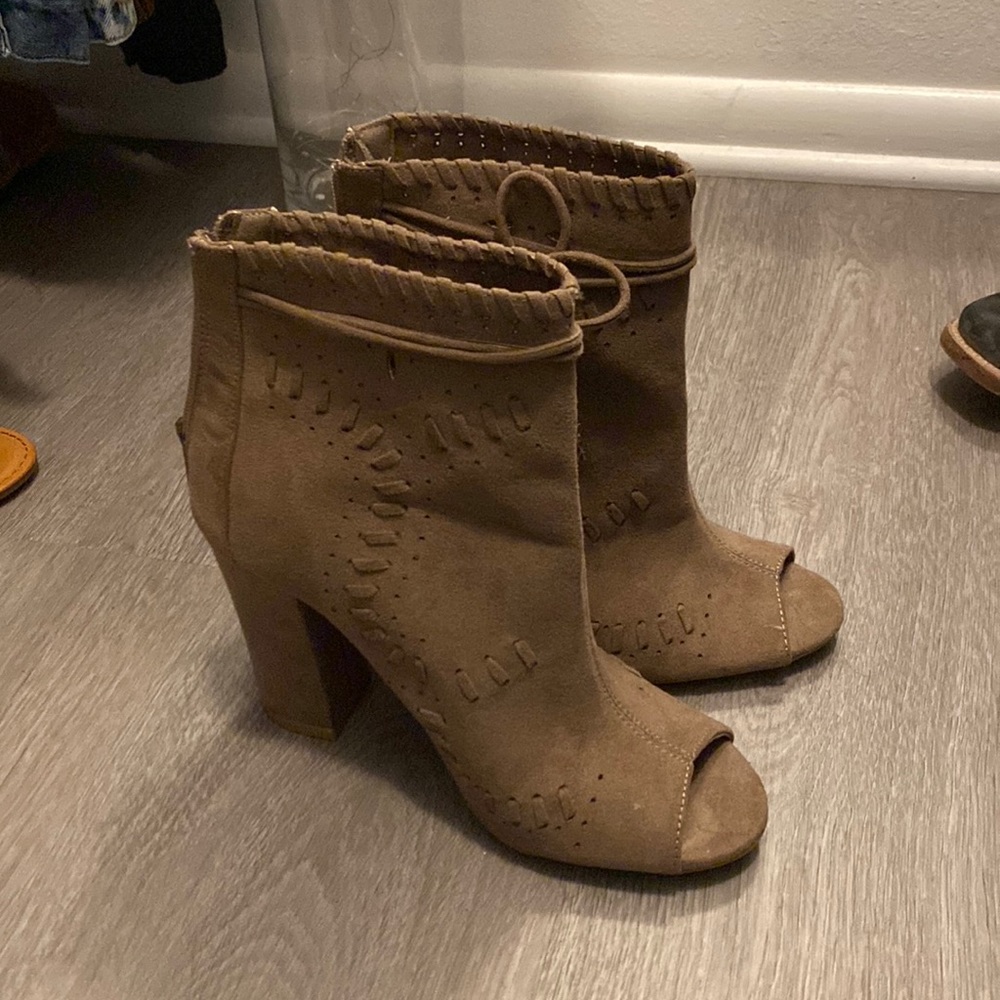 Worn twice. Heel is too high for me